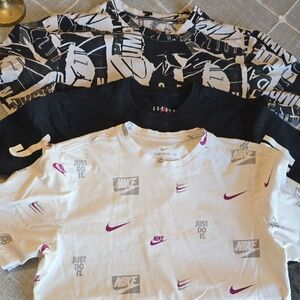 Nike Kids Short Sleeve Tees - Black, White, and Purple